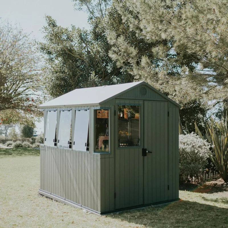 Keter Potting Shed 6x8 ft. Durable Resin Outdoor Garden Greenhouse Shed With Double Doors and Shelves, Green